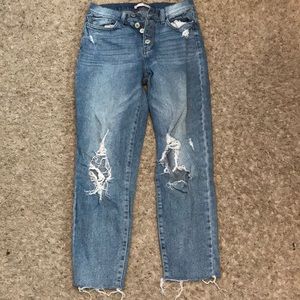 High waisted ripped blue jeans